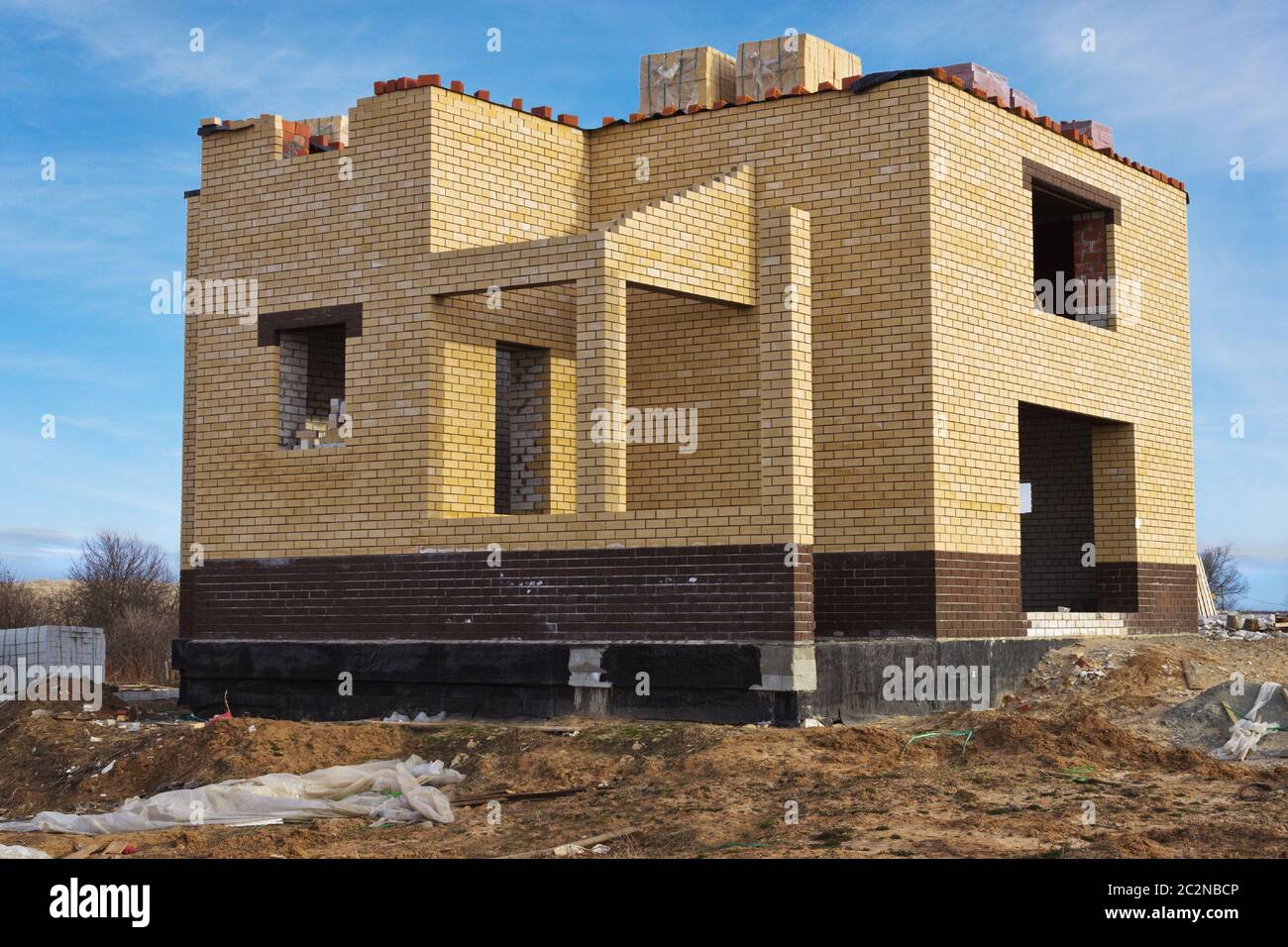 Casa individuale di mattoni gialli Foto Stock