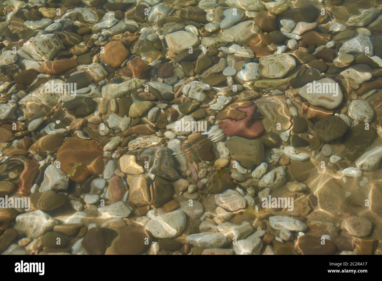 Consistenza di ciottoli sotto l'acqua. Foto Stock