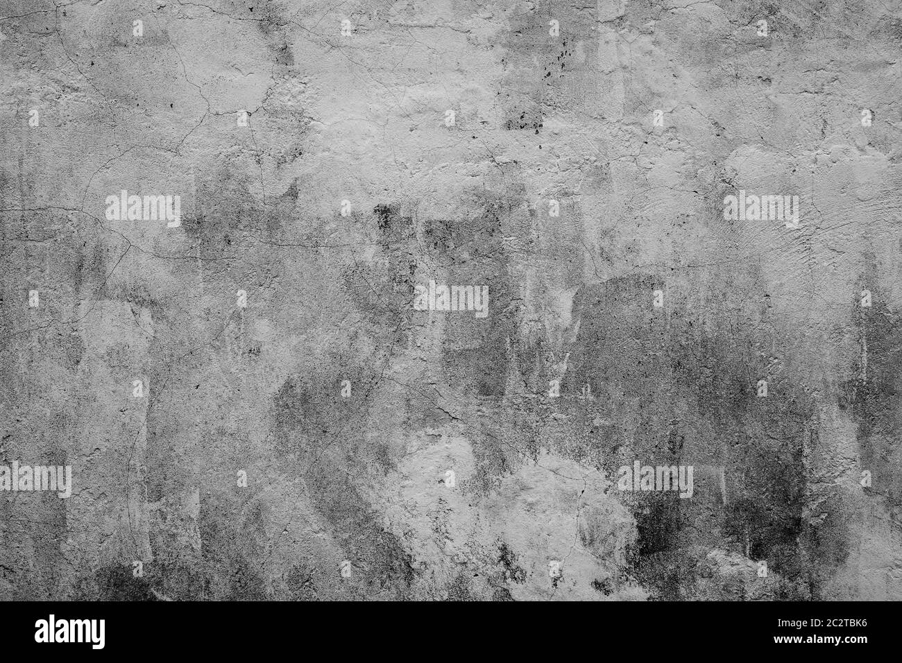 Calcestruzzo grunge muro di cemento con fessurazioni. Foto Stock