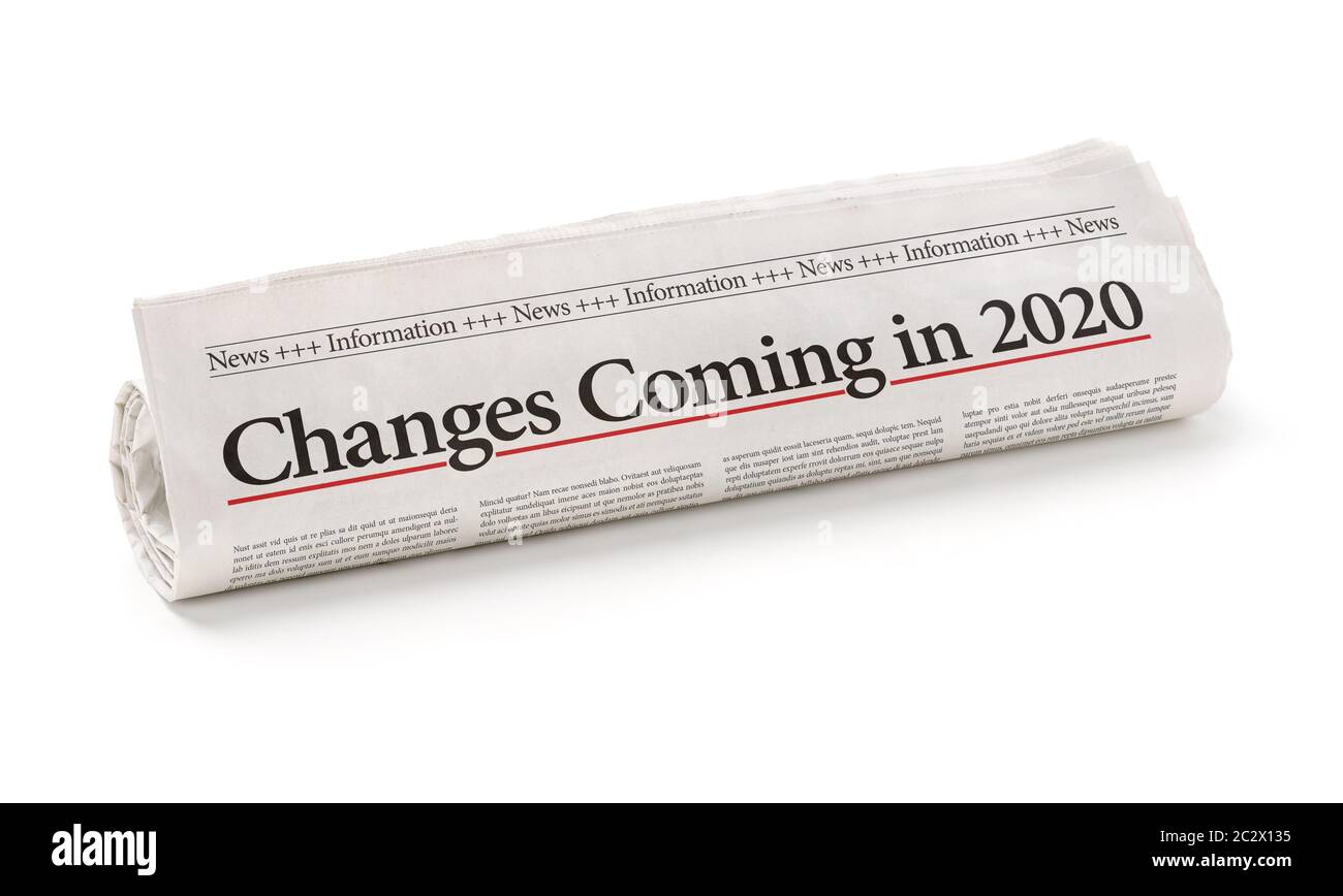 Giornale arrotolato con la headline cambiamenti in arrivo nel 2020 Foto Stock