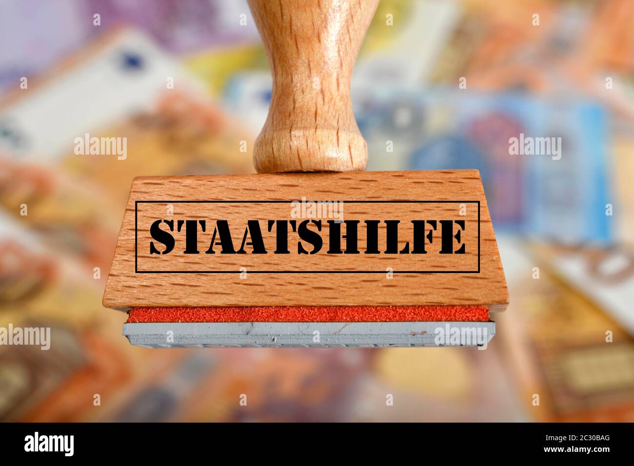 Simbolo immagine pacchetto di stimoli economici, timbro con iscrizione STAATSTHILFE, Germania Foto Stock