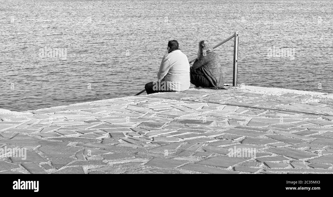 Uomini al mare Foto Stock