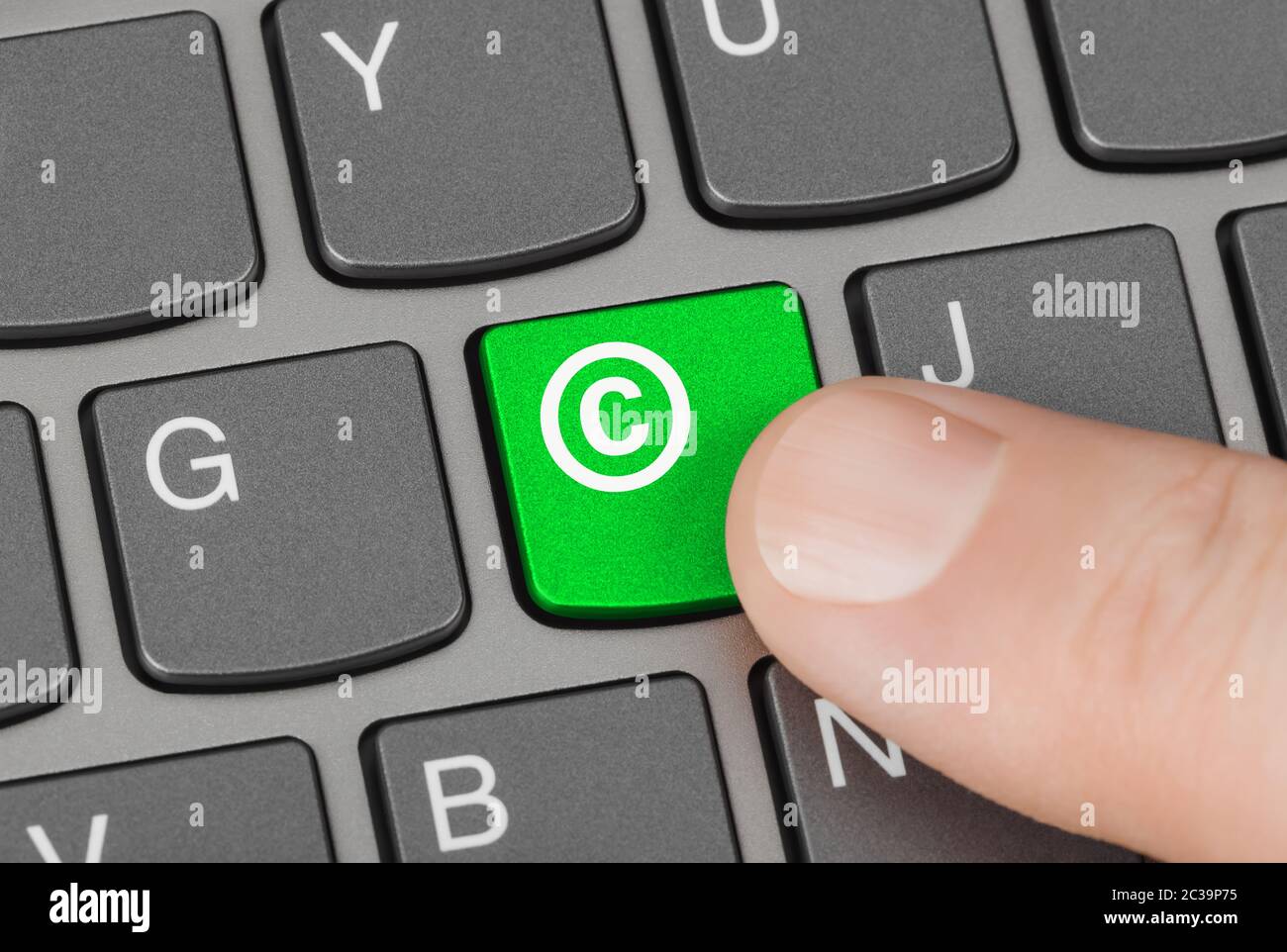 Tastiera del computer con il simbolo di copyright Foto stock - Alamy