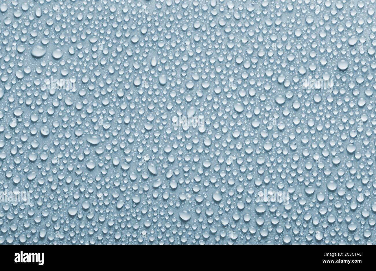 Gocce di pioggia sfondo, gocce d'acqua di colore blu texture Foto Stock