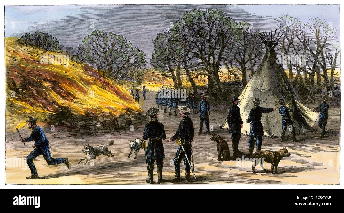 ESERCITO DEGLI STATI UNITI che brucia Cheyenne villaggio vicino Fort Larned, Kansas, 1867. Taglio in legno colorato a mano Foto Stock