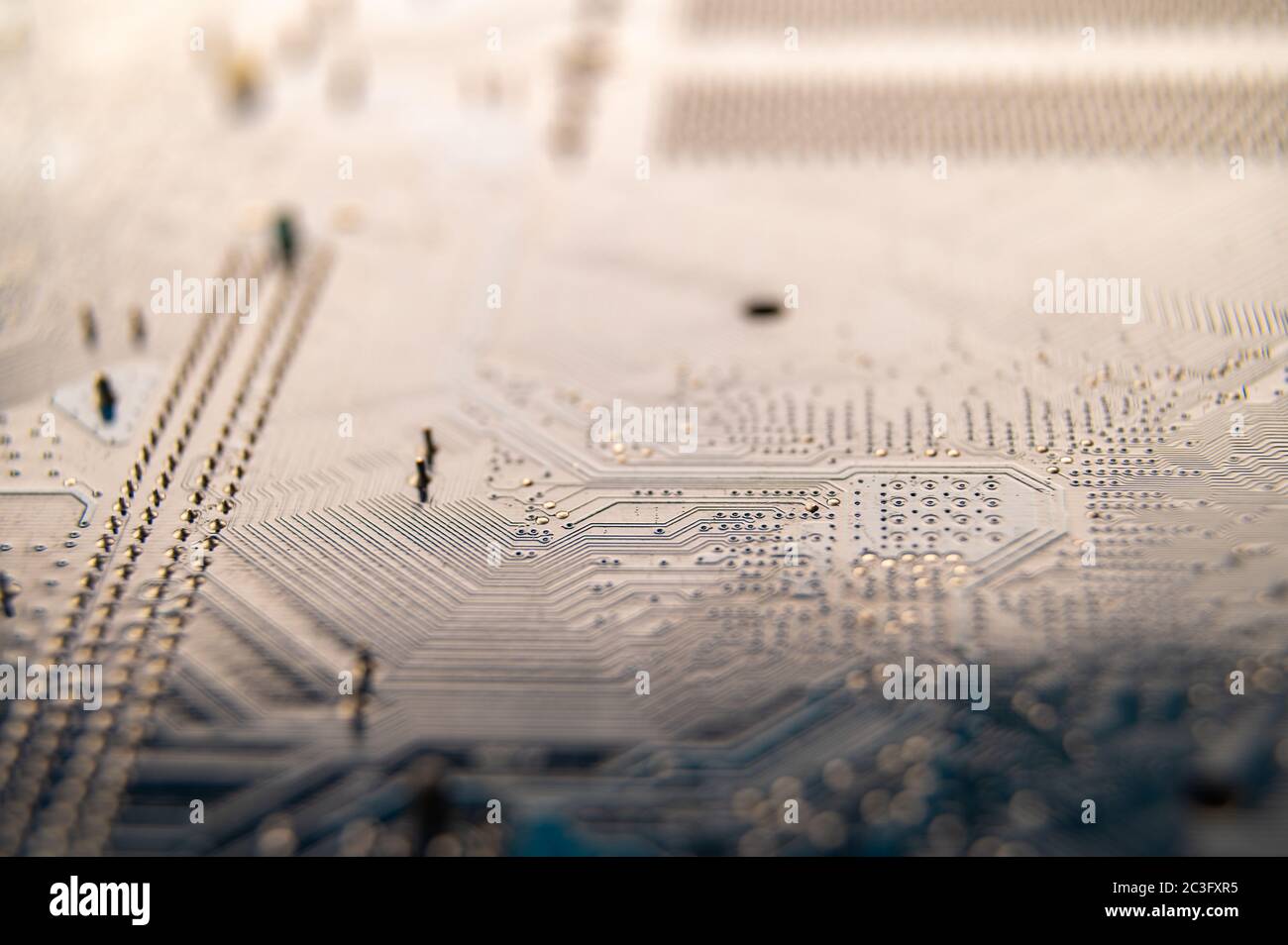 Primo piano della scheda a circuiti stampati per computer, concetto di industria informatica. Foto Stock
