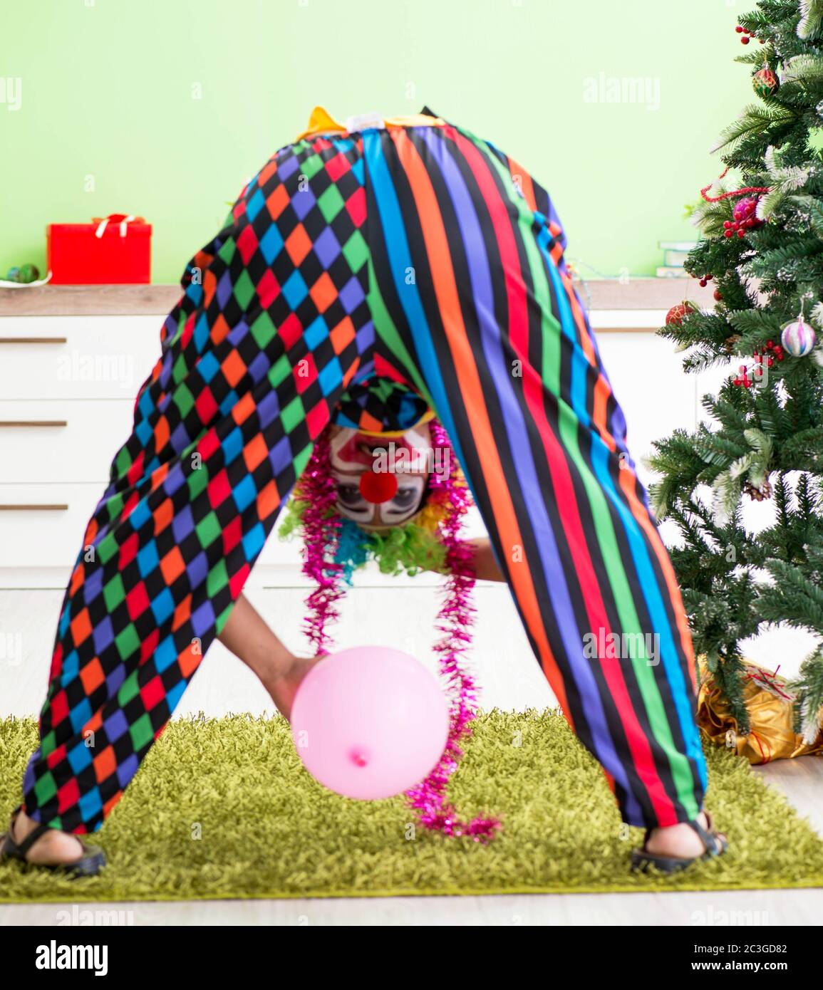 Funny clown nella celebrazione di Natale la nozione Foto Stock