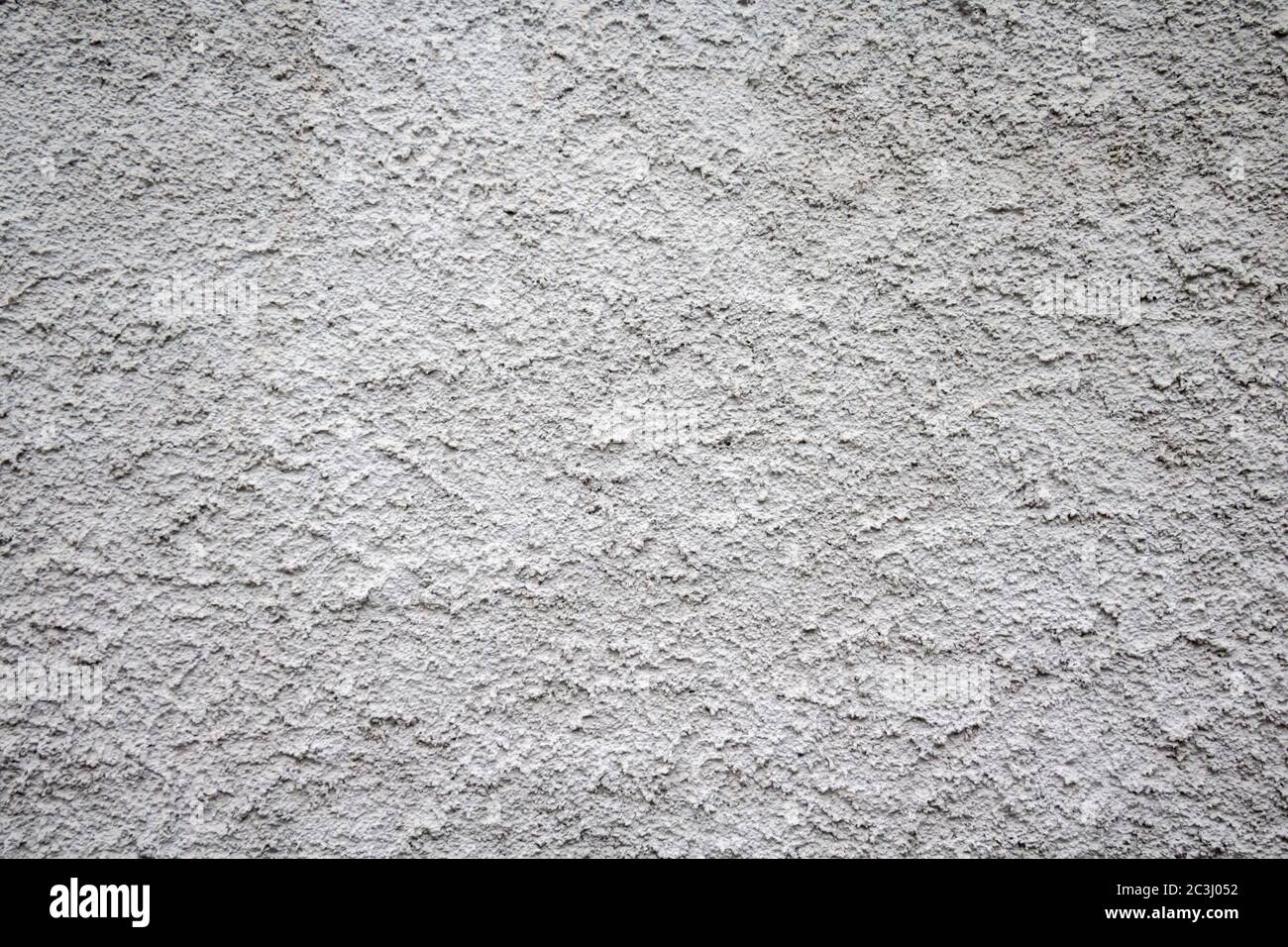 Colore bianco grigio, intonaco fondo ruvido, materiale grunge parete facciata edificio Foto Stock