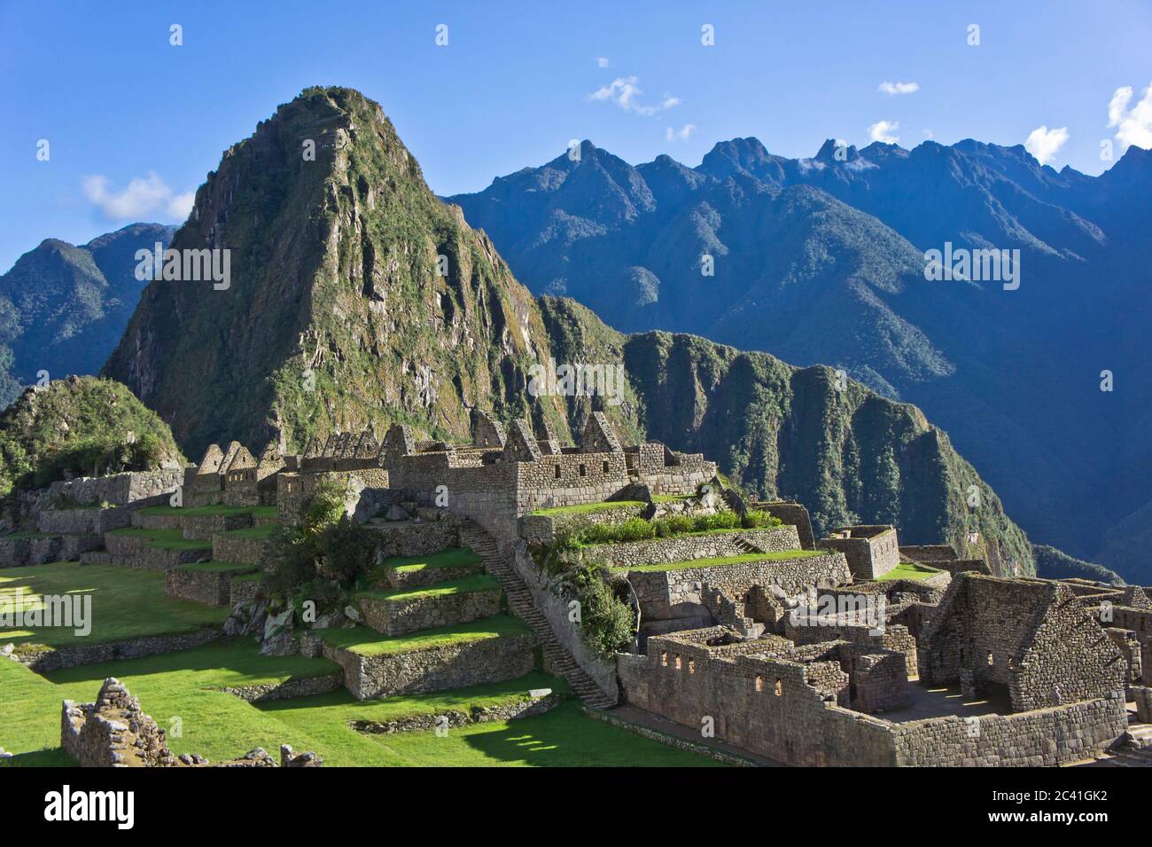 Santuario storico di Machu Picchu, giorno di sole, Cuzco, Valle Sacra, Perù Foto Stock