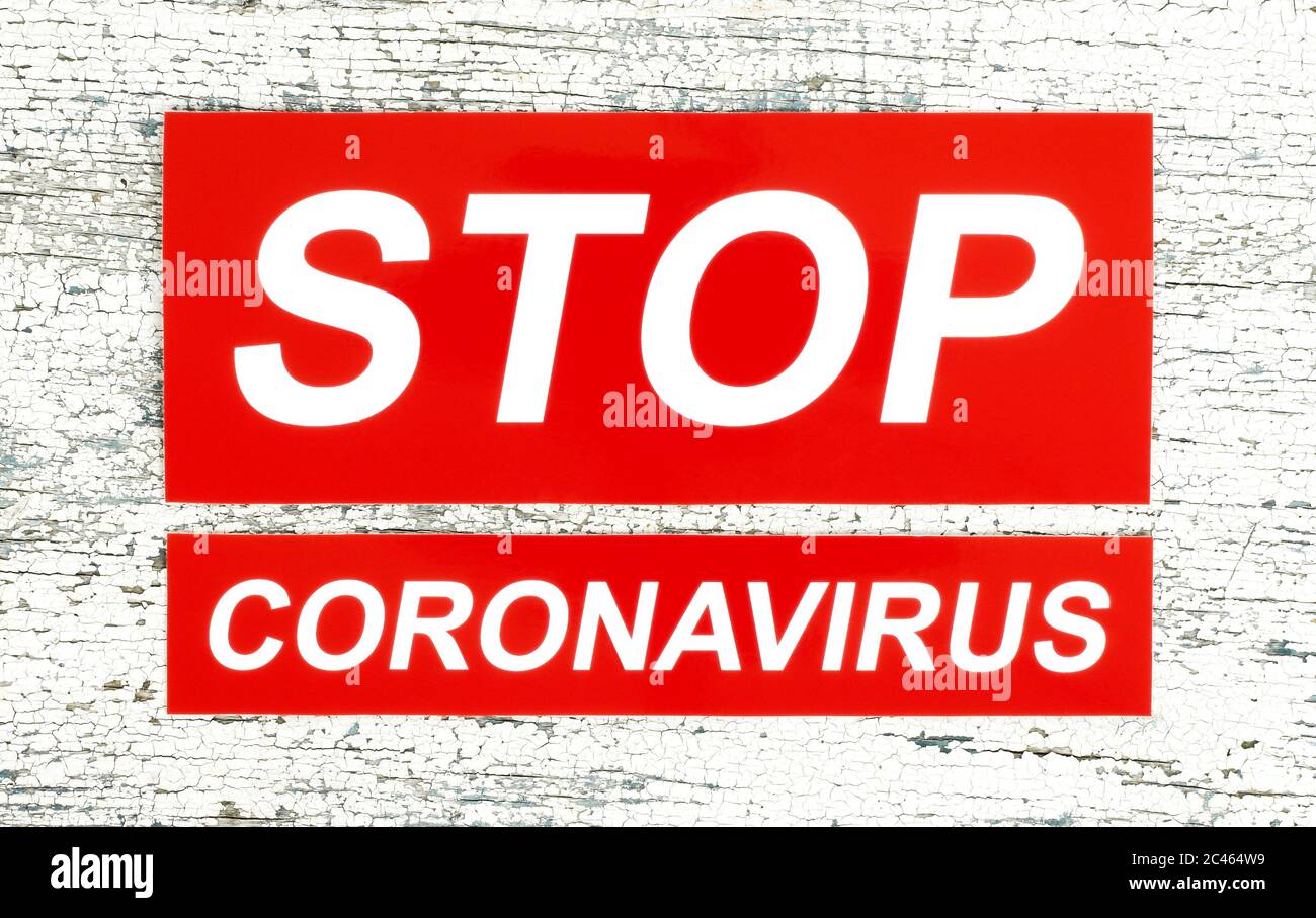 Stop Coronavirus Concept, su sfondo di legno primo piano Foto Stock