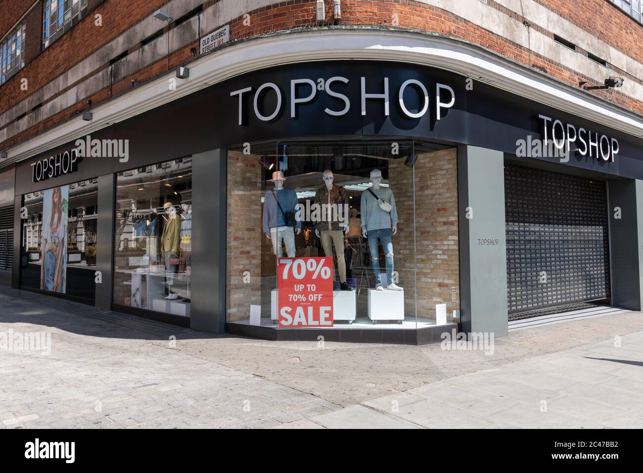 Il negozio di punta della multinazionale britannica di abbigliamento Topshop a Londra Oxford Street. Foto Stock