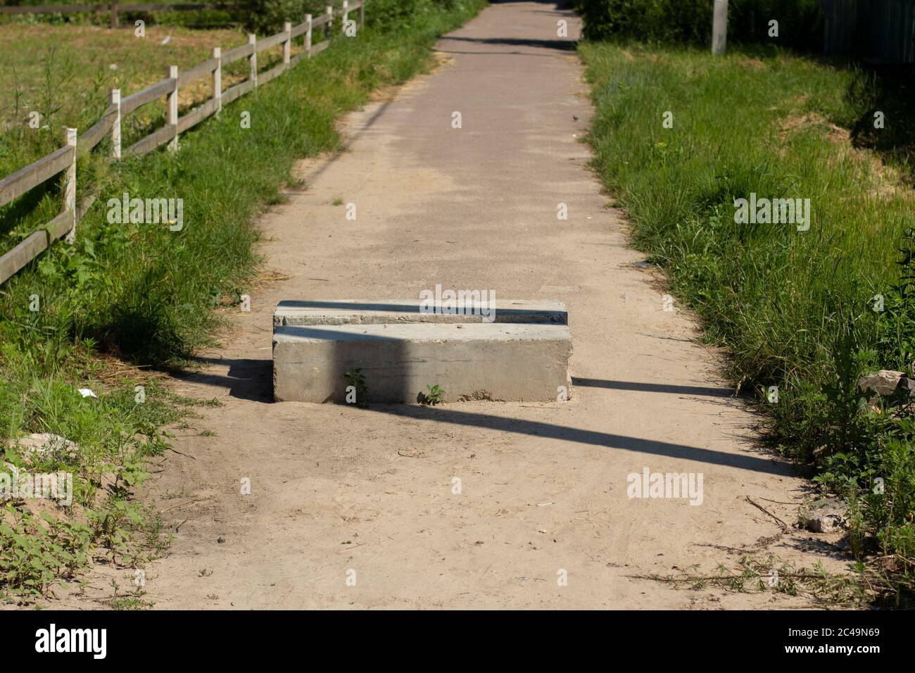 blocco di calcestruzzo di strada sterrata Foto Stock