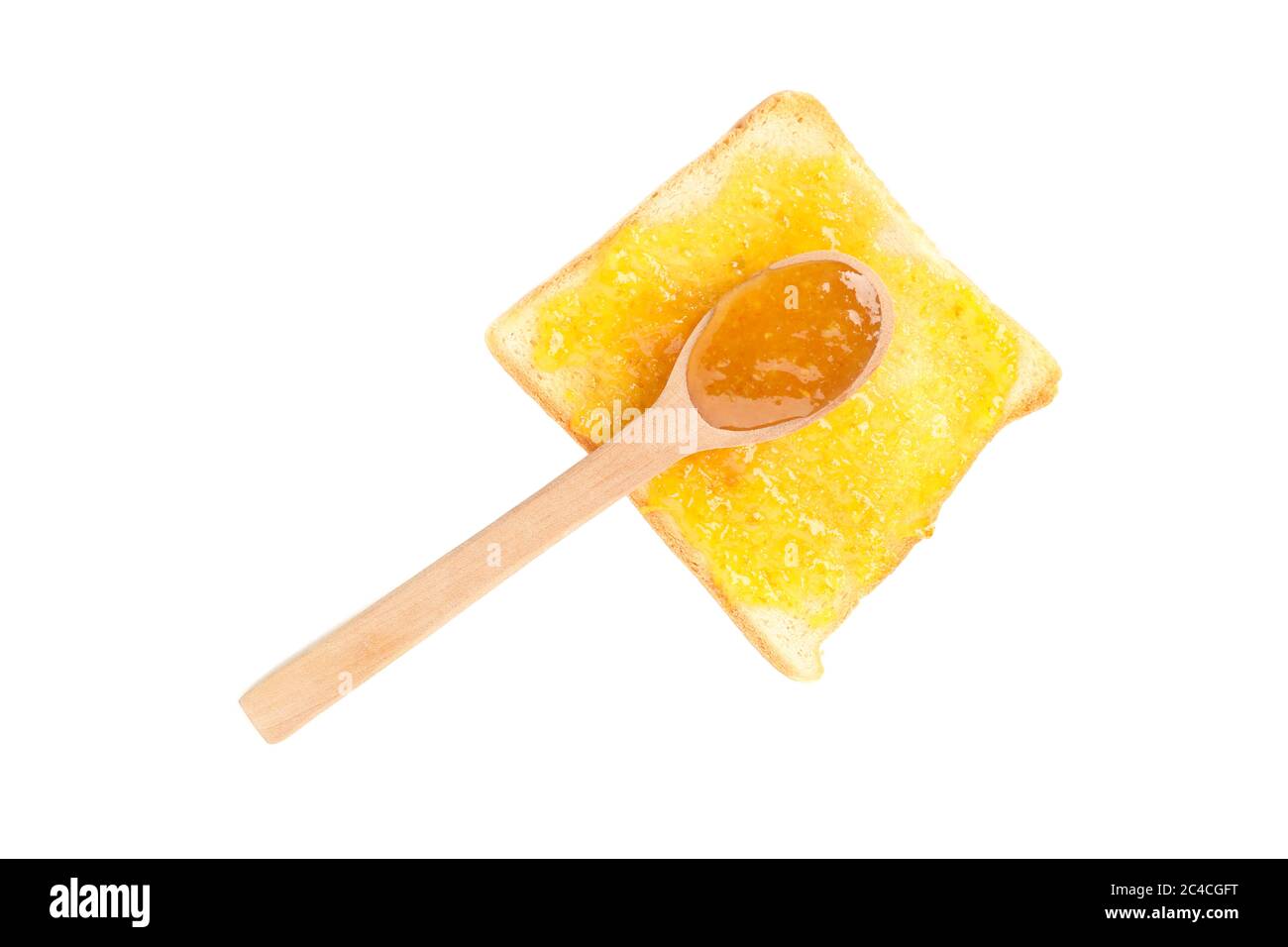 Cucchiaio e brindate con marmellata d'arancia isolata su sfondo bianco Foto Stock