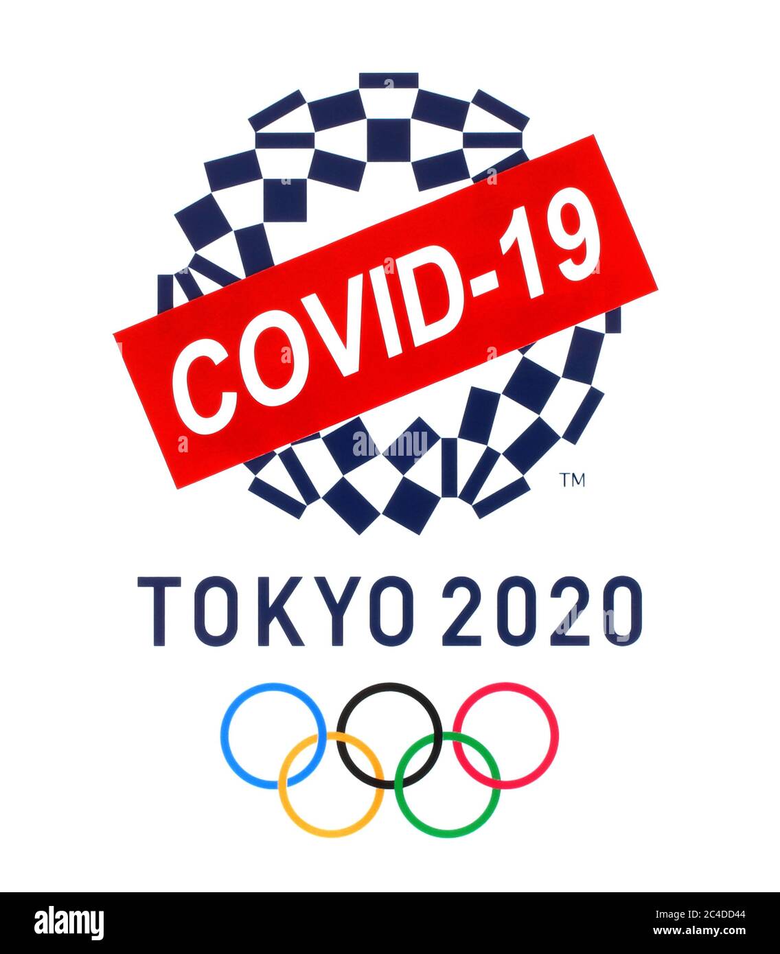 Kiev, Ucraina - Marzo 20,2020: Summer Olympic Games 2020 logo Tokio, Giappone, stampato su carta, barrato da carta segno COVID-19. Le Olimpiadi erano postpo Foto Stock