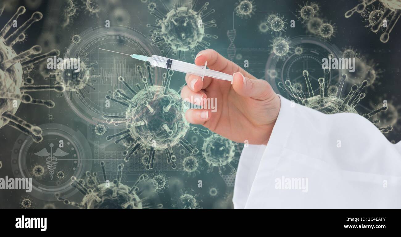 Illustrazione digitale di un medico che tiene una siringa su cellule macro di Coronavirus Covid-19 Foto Stock