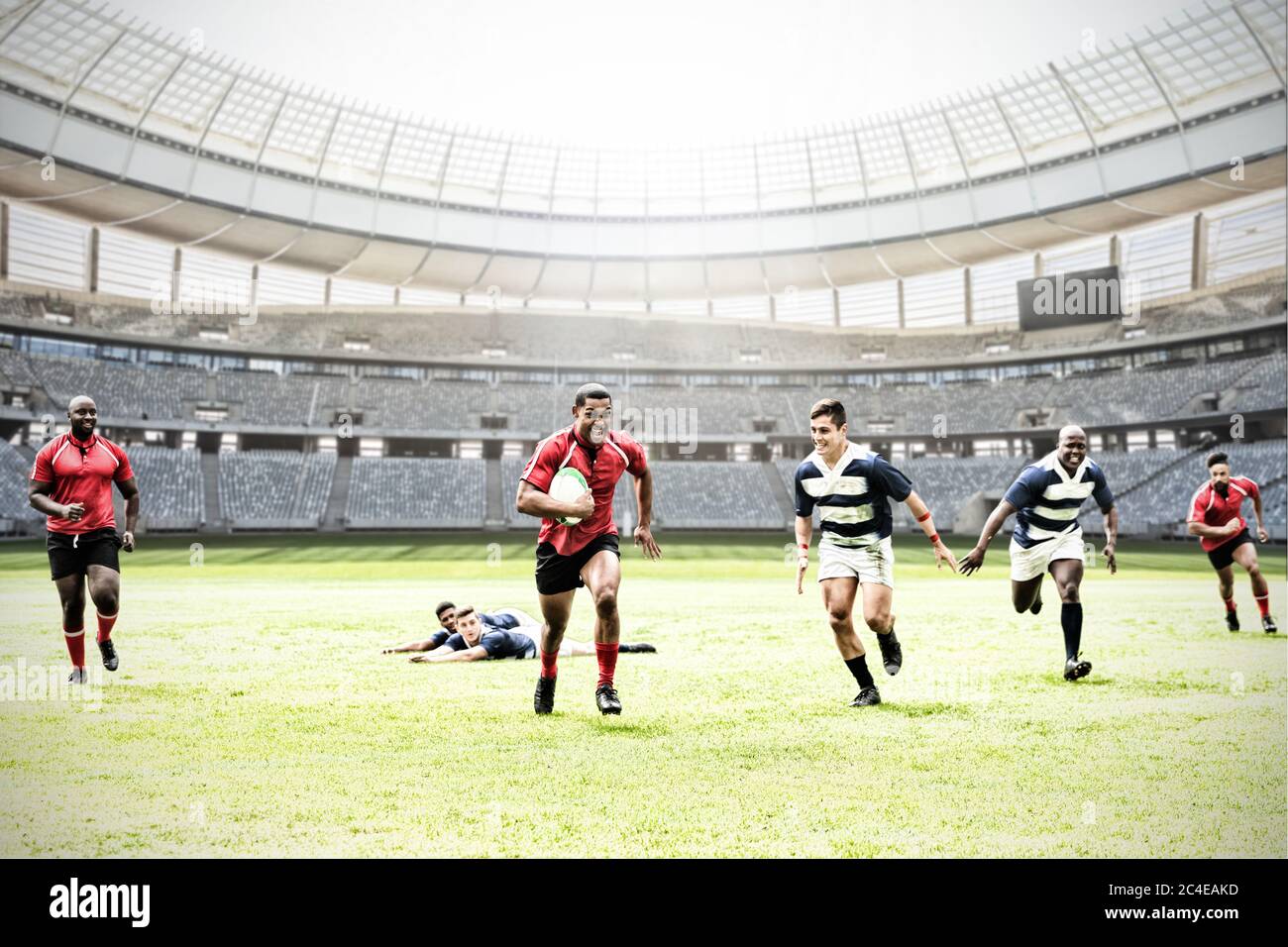 Immagine digitale composita di una squadra di rugby che gioca a rugby nello stadio sportivo Foto Stock