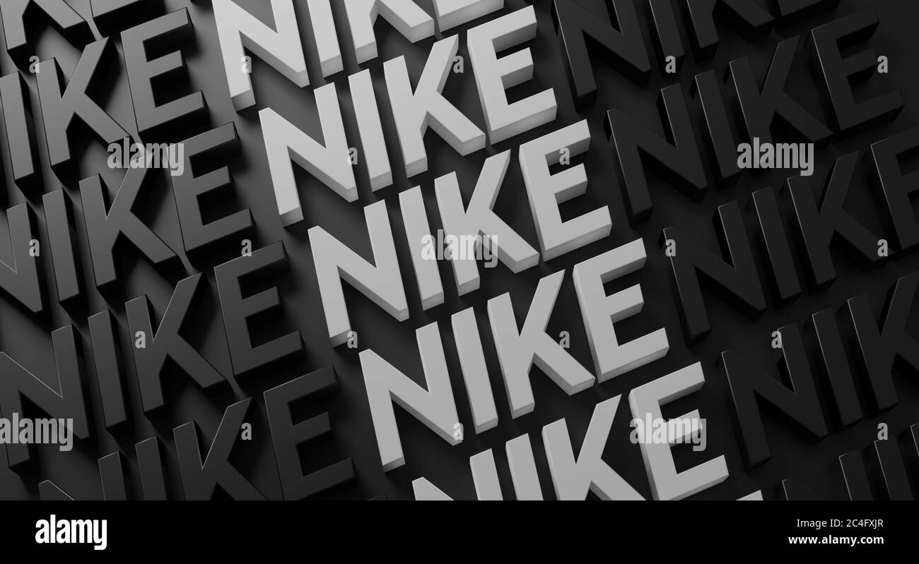 La tipografia multipla Nike sul rendering 3D Dark Wall Foto stock - Alamy