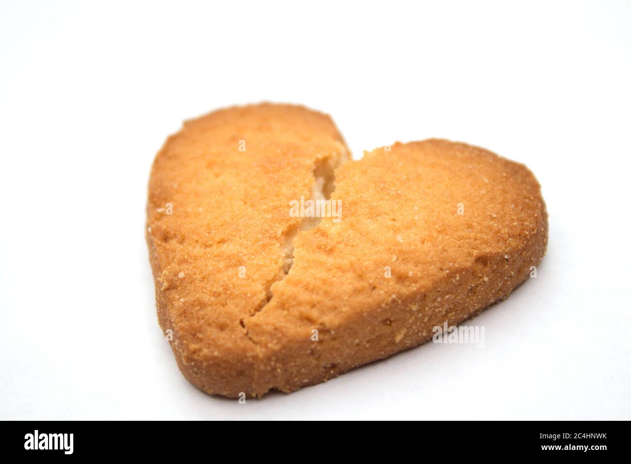 Gustosi biscotti sotto forma di cuori spezzati - un simbolo di amore Foto Stock