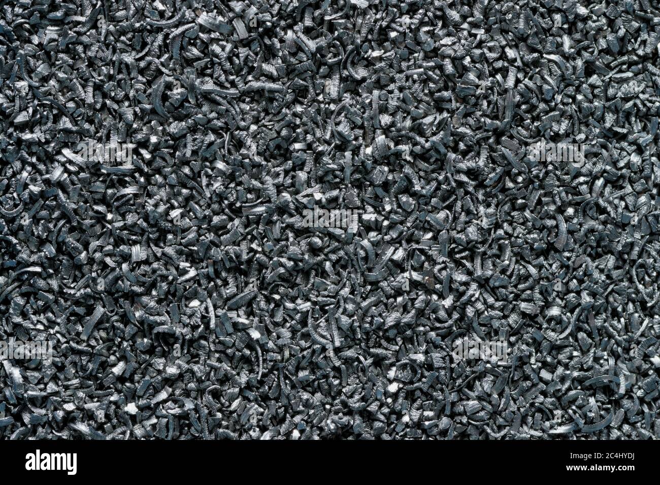 Cumulo di segatura metallica, rifiuti industriali, colpo di primo piano, sfondo astratto Foto Stock