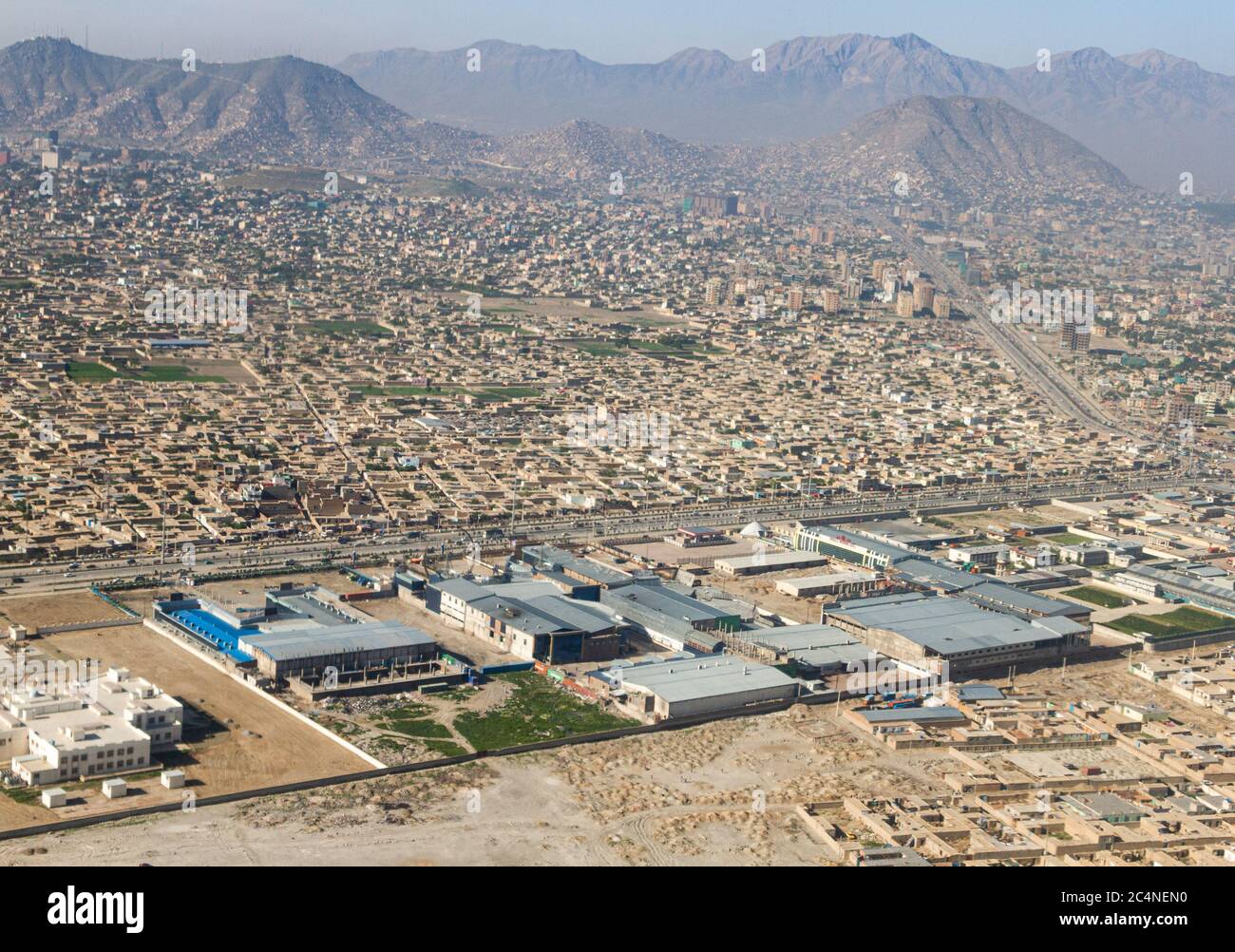 Una zona industriale era situata nella zona centrale delle case residenziali, Kabul Afghanistan Foto Stock