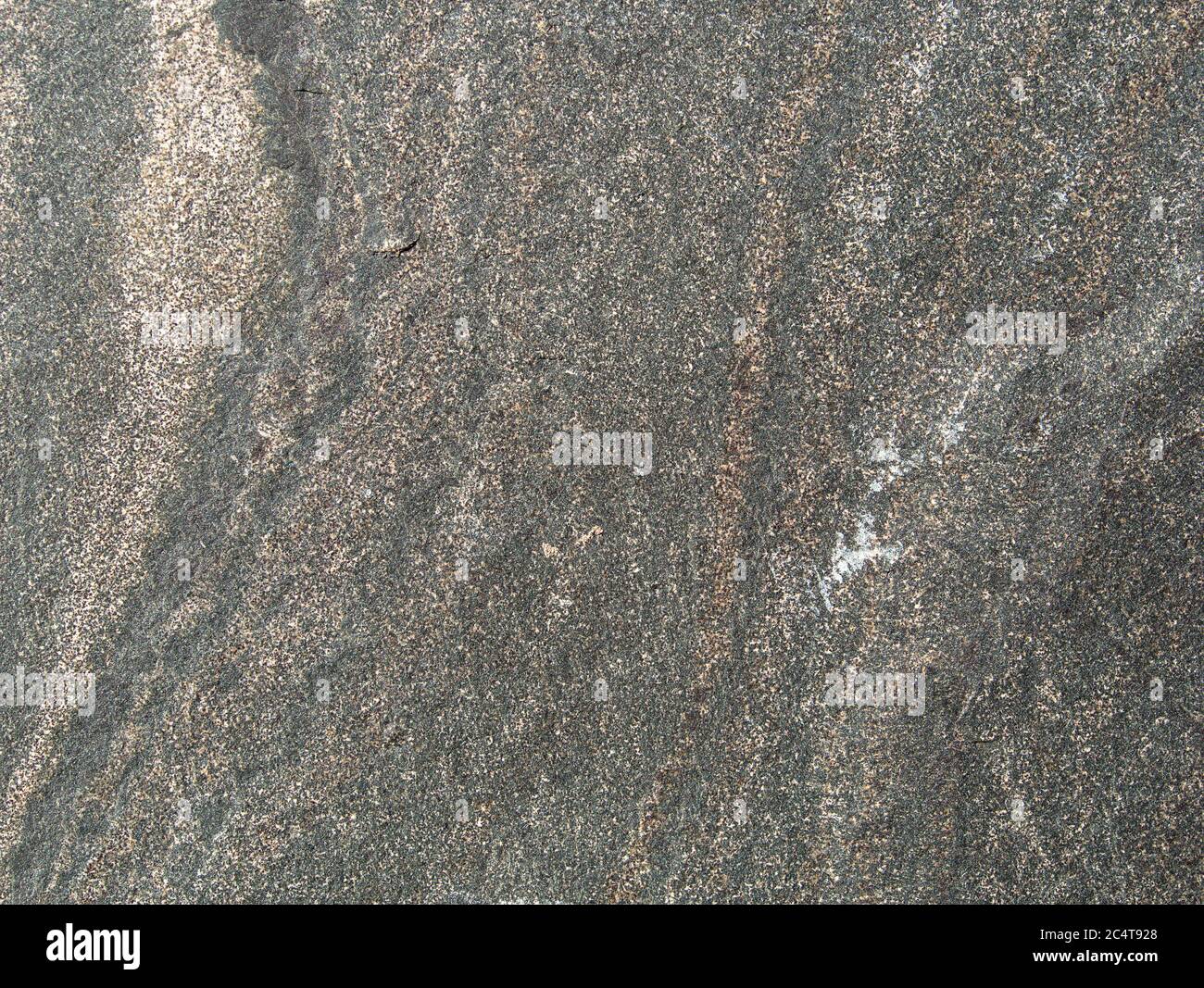 Varie lastre di pietra di granito, basalto o arenaria, da grigio a colorato, come sfondo, primo piano Foto Stock