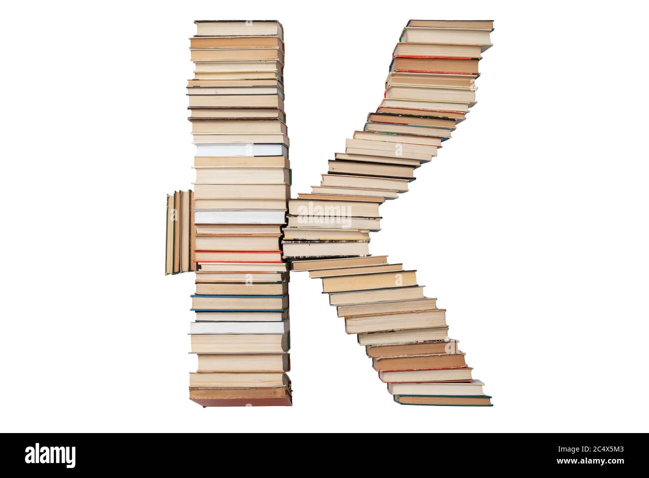 Lettera - K fatto di libri isolati su sfondo bianco. Libro mockup carattere lettera dall'alfabeto. Concetto di istruzione. Nessuno Foto Stock