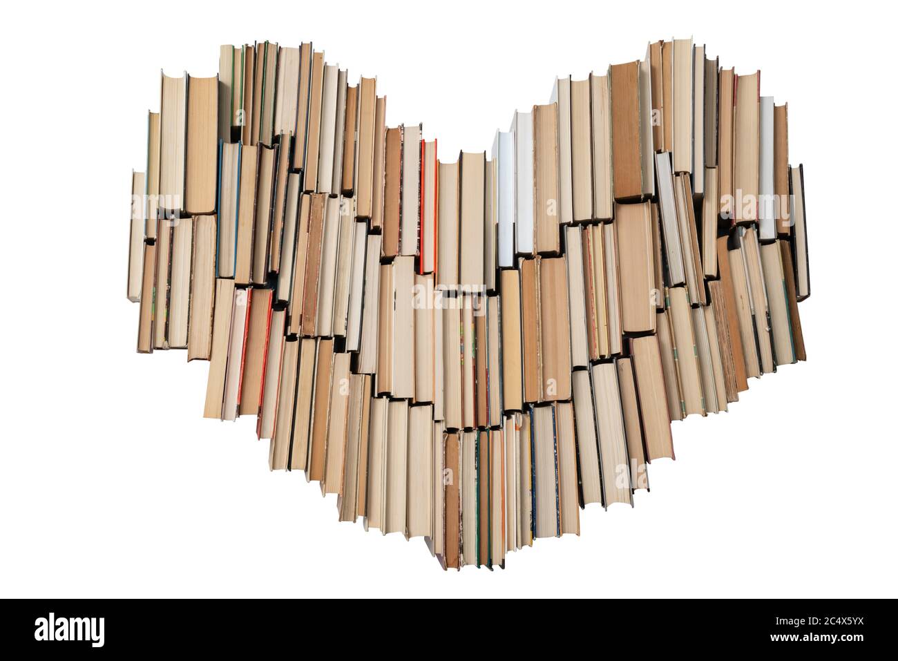 Forma del cuore fatta di libri isolati su sfondo bianco. Concetto di amore e di educazione. Nessuno Foto Stock