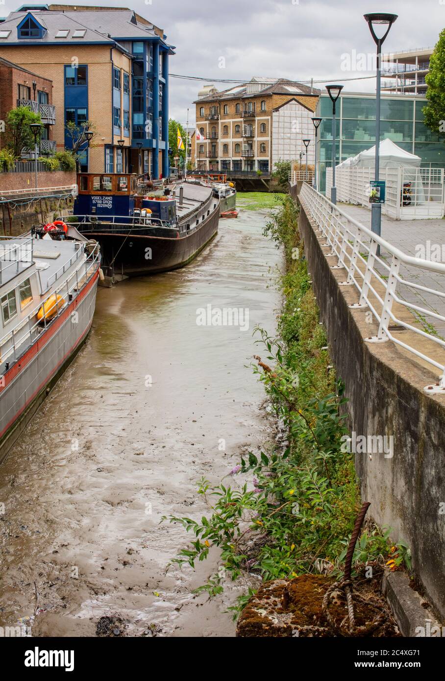 Ransonome's Dock, Battersea; un tempo casa di Ransonome's, una società di ingegneria. Ora ormeggi per case galleggianti e il sito di Foster e Partners Foto Stock