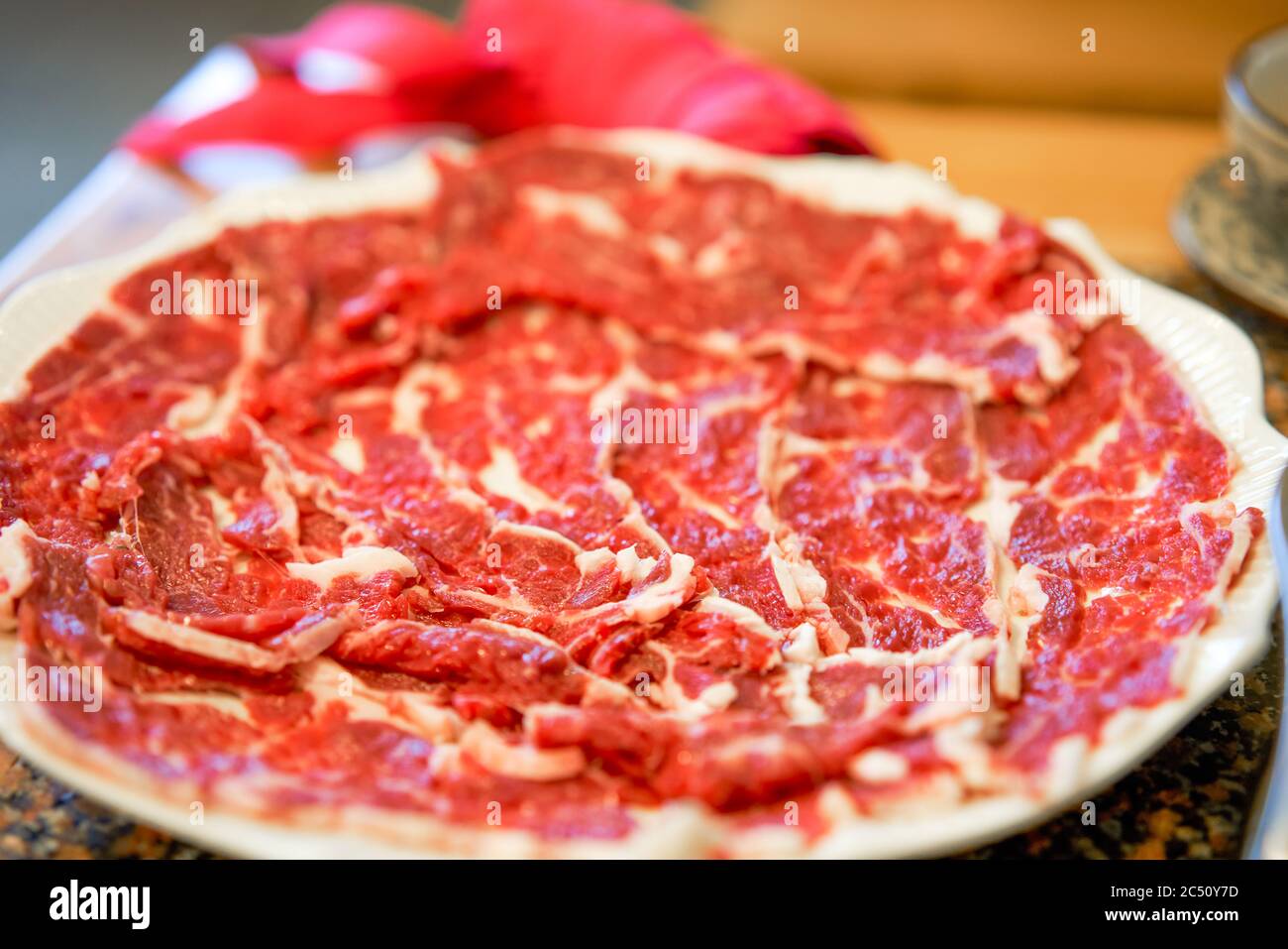 Un piatto di piatti caldi Chongqing, manzo fresco tagliato a mano Foto Stock