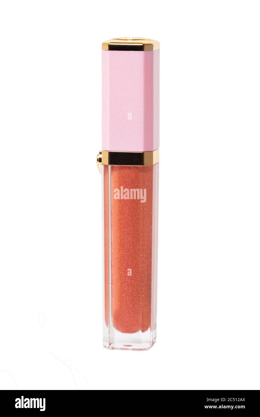 Bottiglia lucida con labbro. Primo piano di un elegante e lussuoso tubo chiuso con bordo rosa colorato lucido con effetto glitter per labbra grumo naturale isolate su un wh Foto Stock