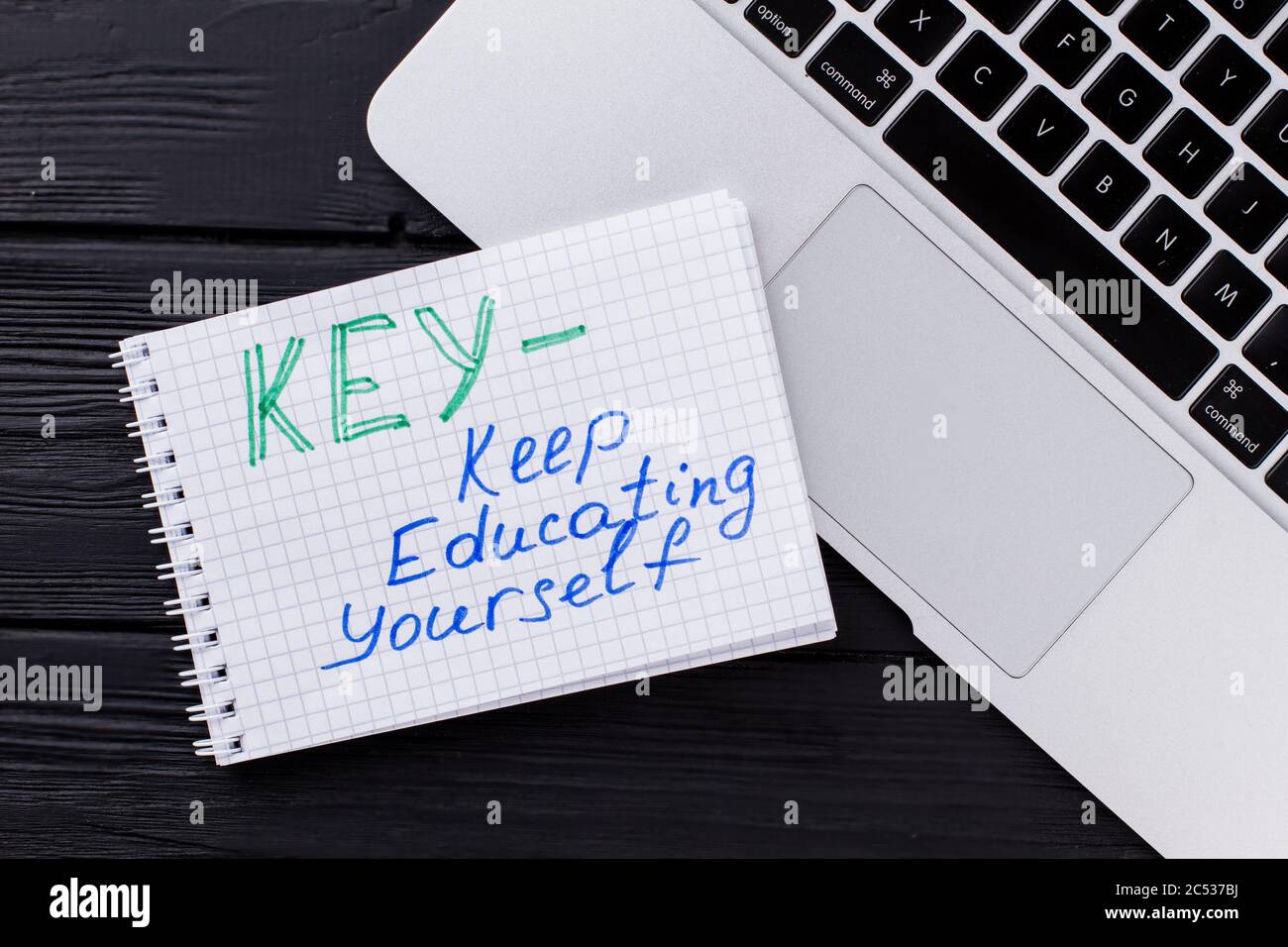 Notebook e blocco note con abbreviazione. Foto Stock