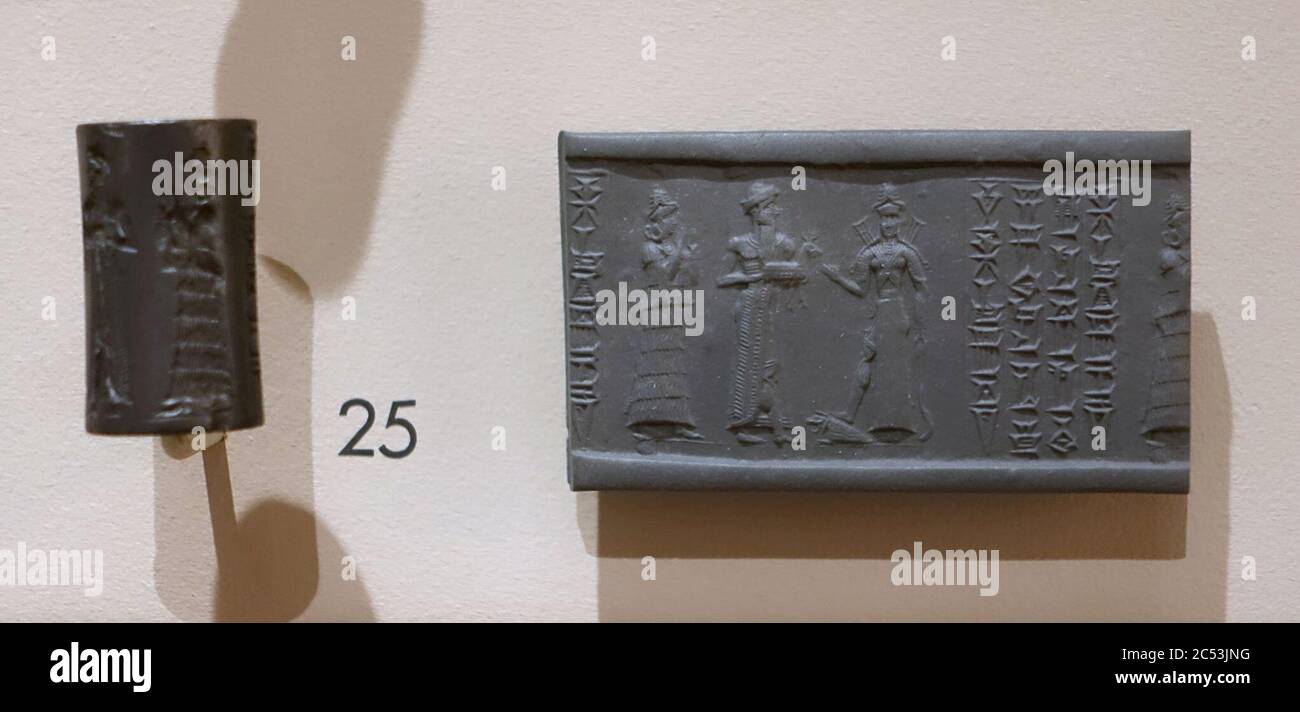 Sigillo di cilindro inscritto con scena di presentazione, periodo di Babilonia Vecchia, c. 2000-1600 A.C. Foto Stock