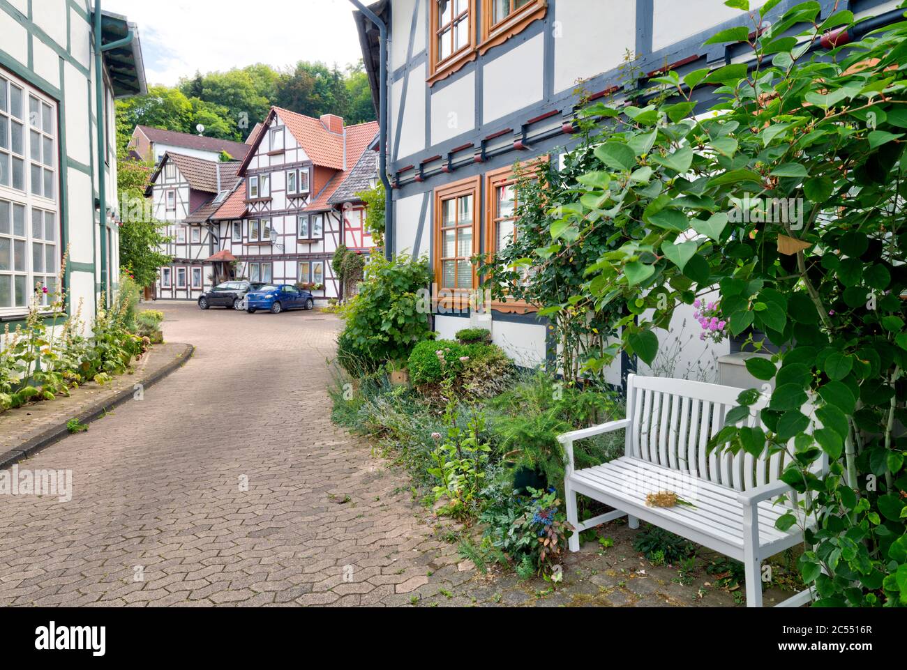 Casa facciata, finestra, panca, decorazione floreale, legno a metà, Bad Sooden-Allendorf, Hesssen, Germania, Europa Foto Stock