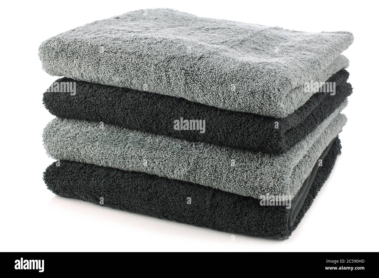 asciugamani da bagno in nero e grigio su sfondo bianco Foto stock - Alamy