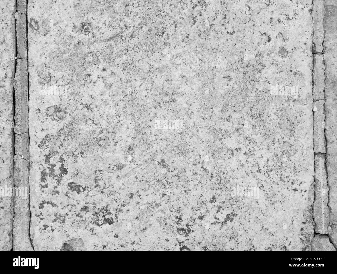 La tessitura di un vecchio muro di pietra Foto Stock