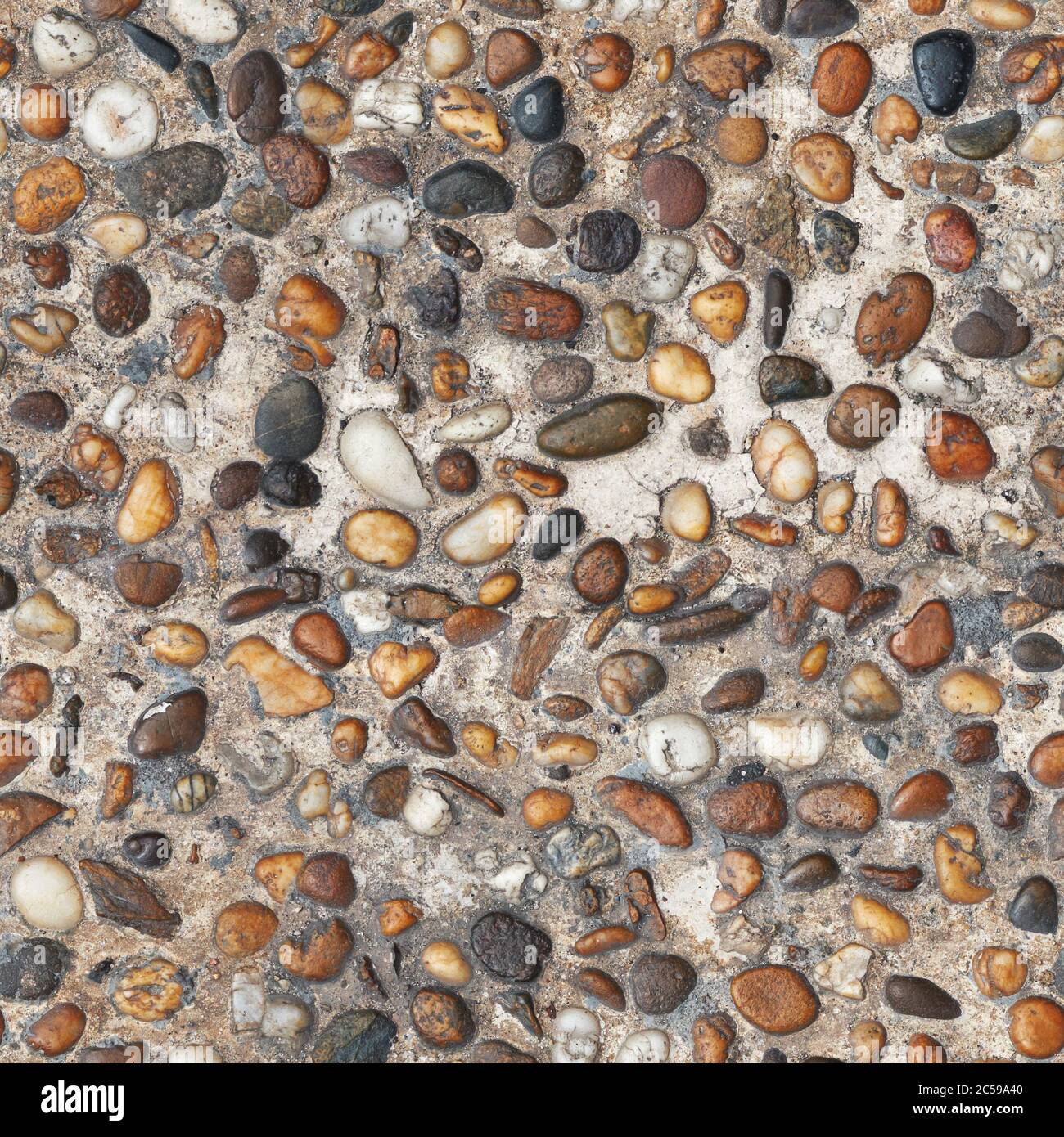 pietre di ghiaia di colore in cemento pavimento. Texture senza cuciture Foto Stock