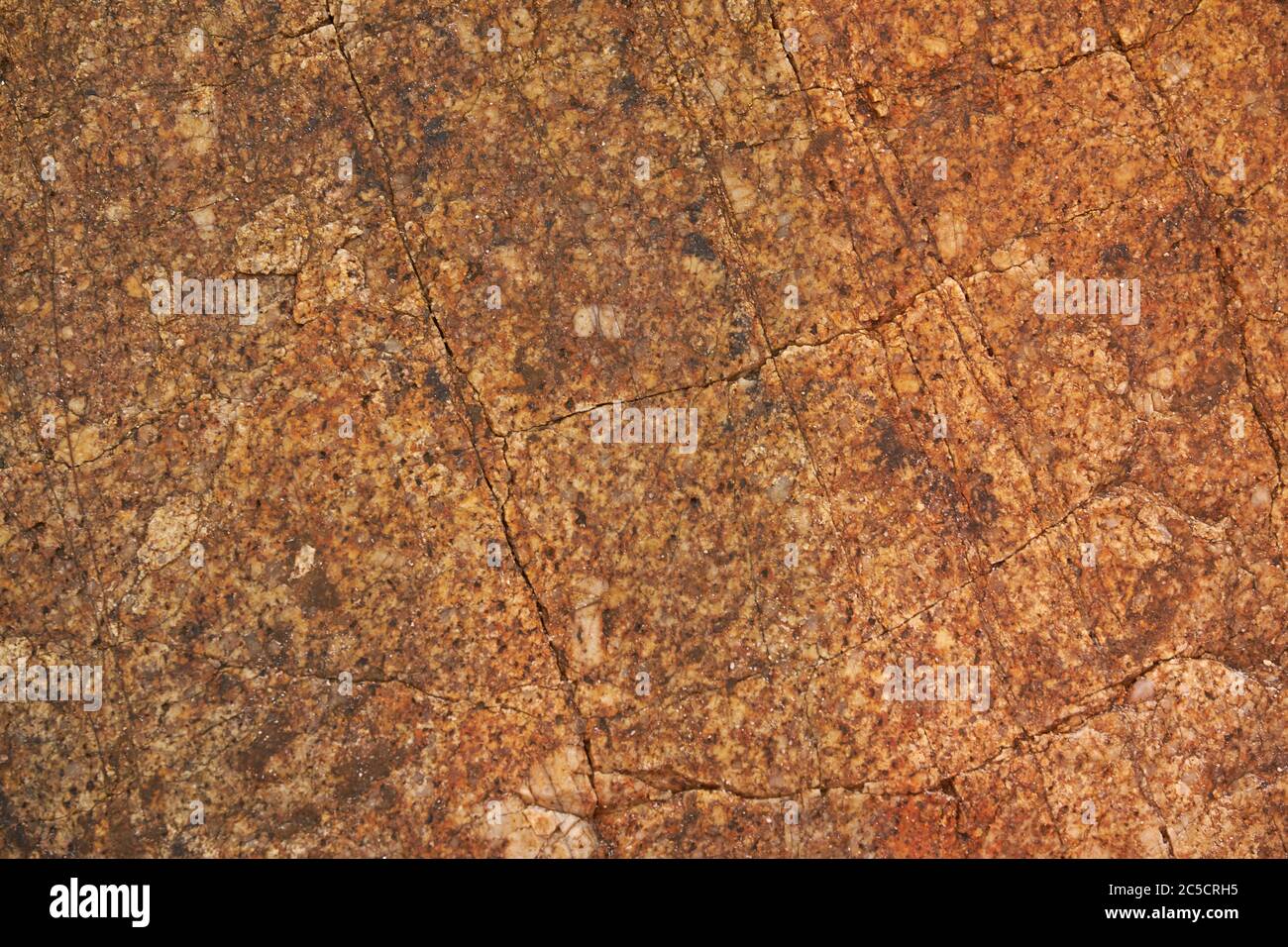 Cracked vecchio granito marrone pietra tessitura Foto Stock