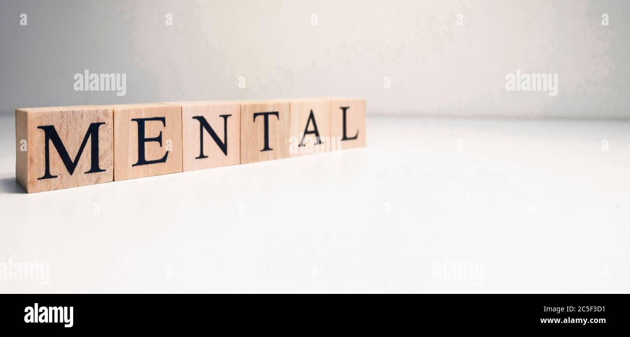 Testo di salute mentale da cubi di legno. Consept sulla salute. Foto Stock