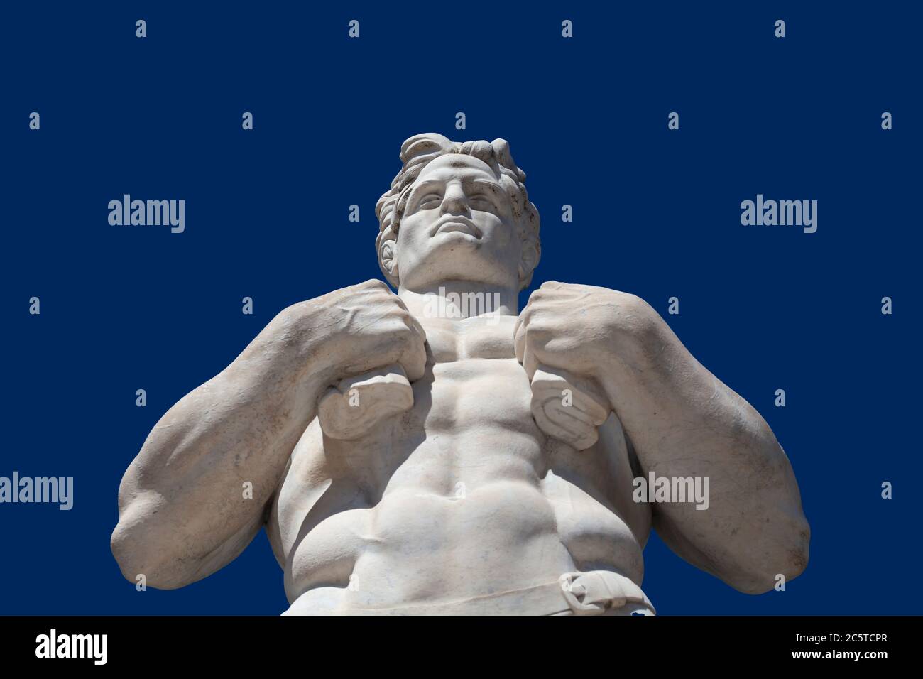 Atleta statua in marmo ritratto contro cielo blu - luce solare Foto Stock