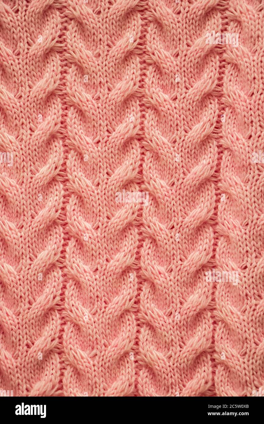 La texture di un pullover a maglia intima. Maglieria, accessori per la casa. Foto Stock