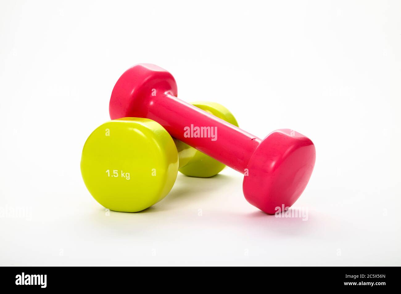 Due manubri da allenamento di peso isolati su sfondo bianco Foto stock -  Alamy