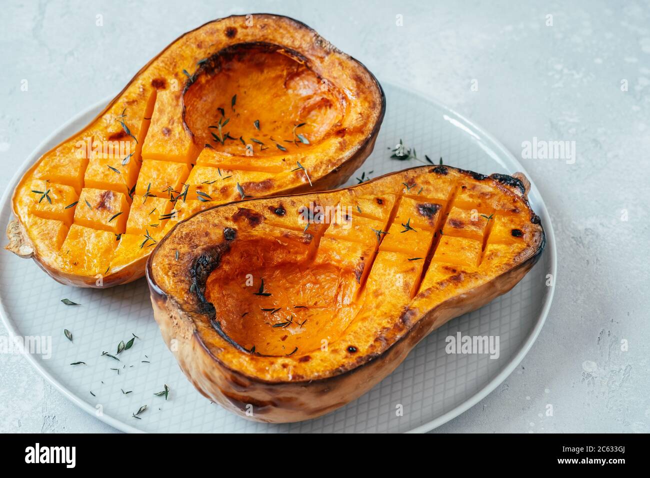 Zucca arrosto di zucca e erbe Foto Stock