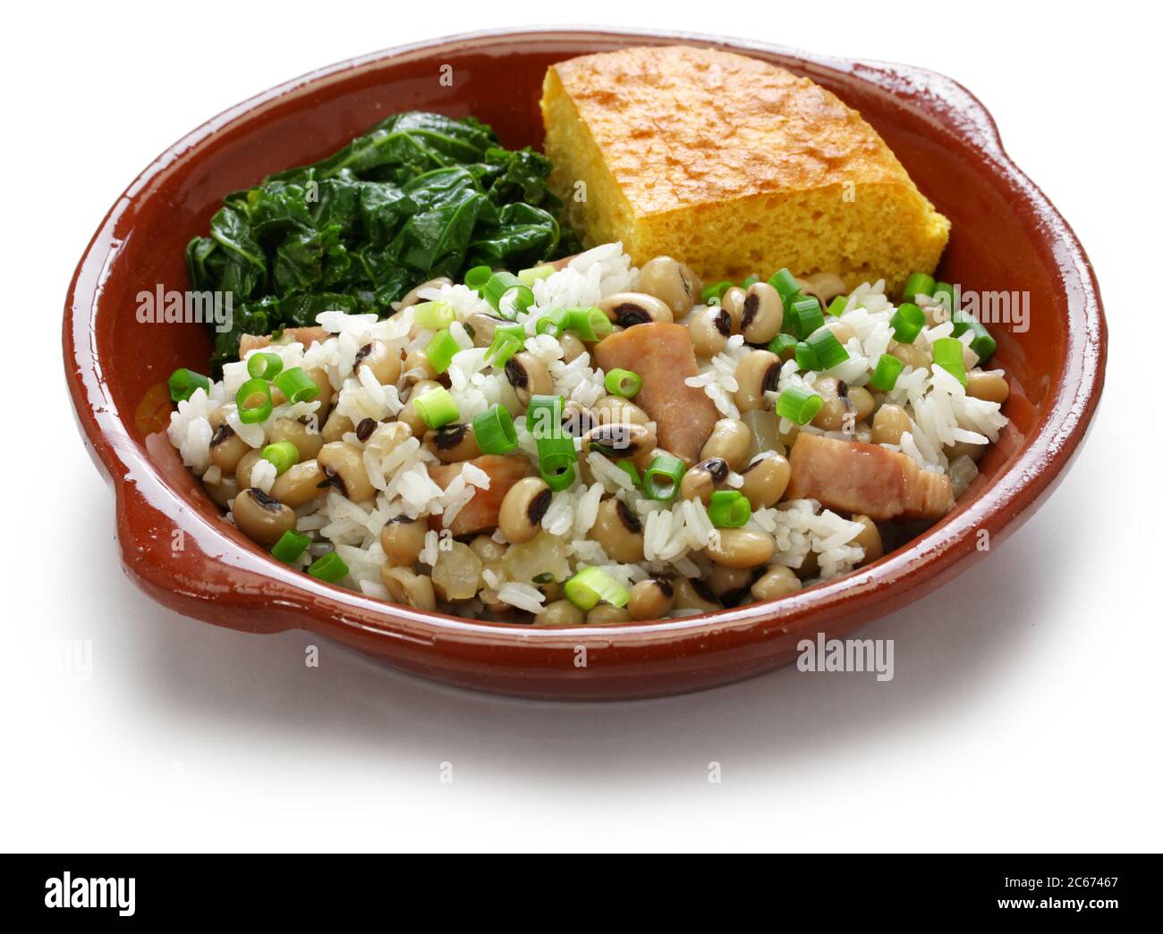 hoppin john: nuovo anno cibo tradizionale: piselli dagli occhi neri e riso, pane di mais e kale: cibo del sud Foto Stock