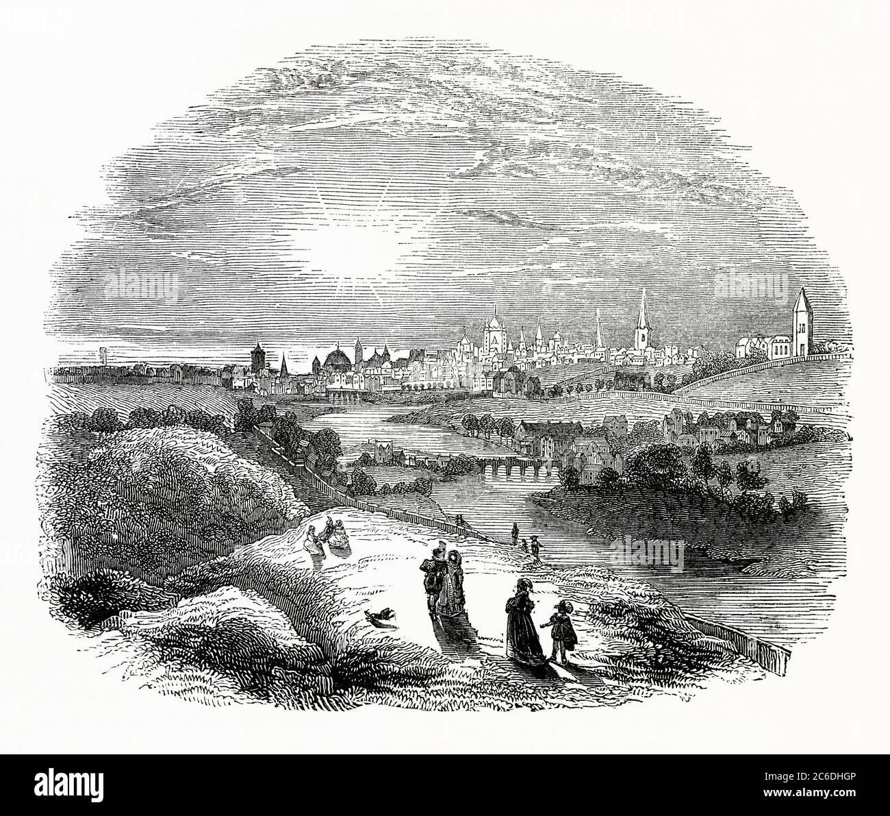 Una vecchia incisione di Dublino, la capitale della Repubblica d'Irlanda agli inizi del 1600. Le numerose chiese della città sono importanti. In primo piano, ad ovest della città, si trova il fiume Liffey con le persone che si trovano a fare una passeggiata. Foto Stock