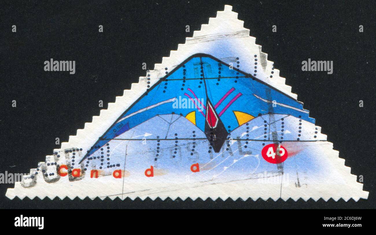 CANADA - CIRCA 1999: Francobollo stampato dal Canada, mostra Master Control, kite sportivo di Lam HOAc (triangolare), circa 1999 Foto Stock