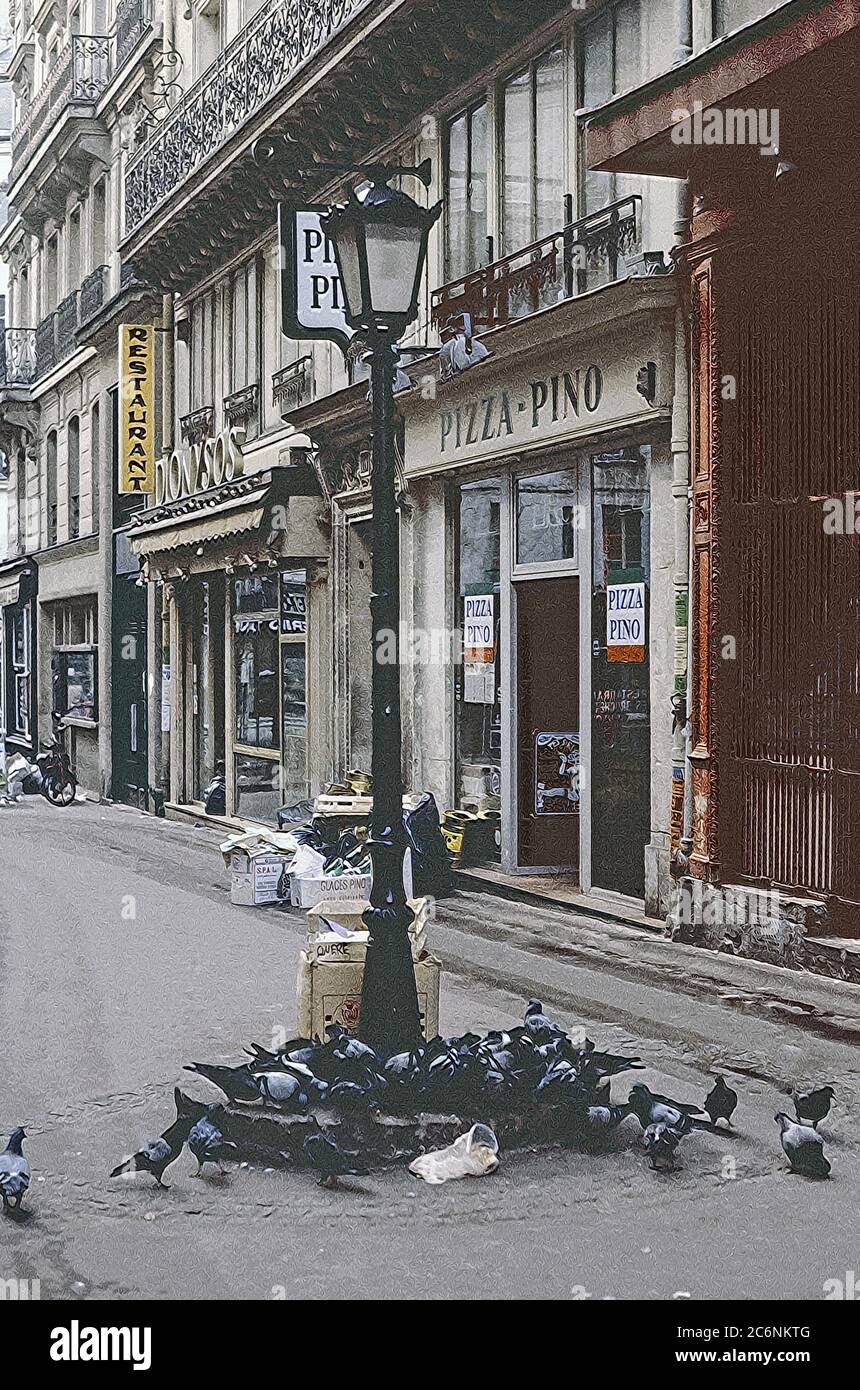 Foto illustration Birds Approfittate degli ultimi sprechi serali per la prima colazione nel quartiere Latino di Parigi nel 1972 Archival scansionato dalla diapositiva; 1972 Foto Stock