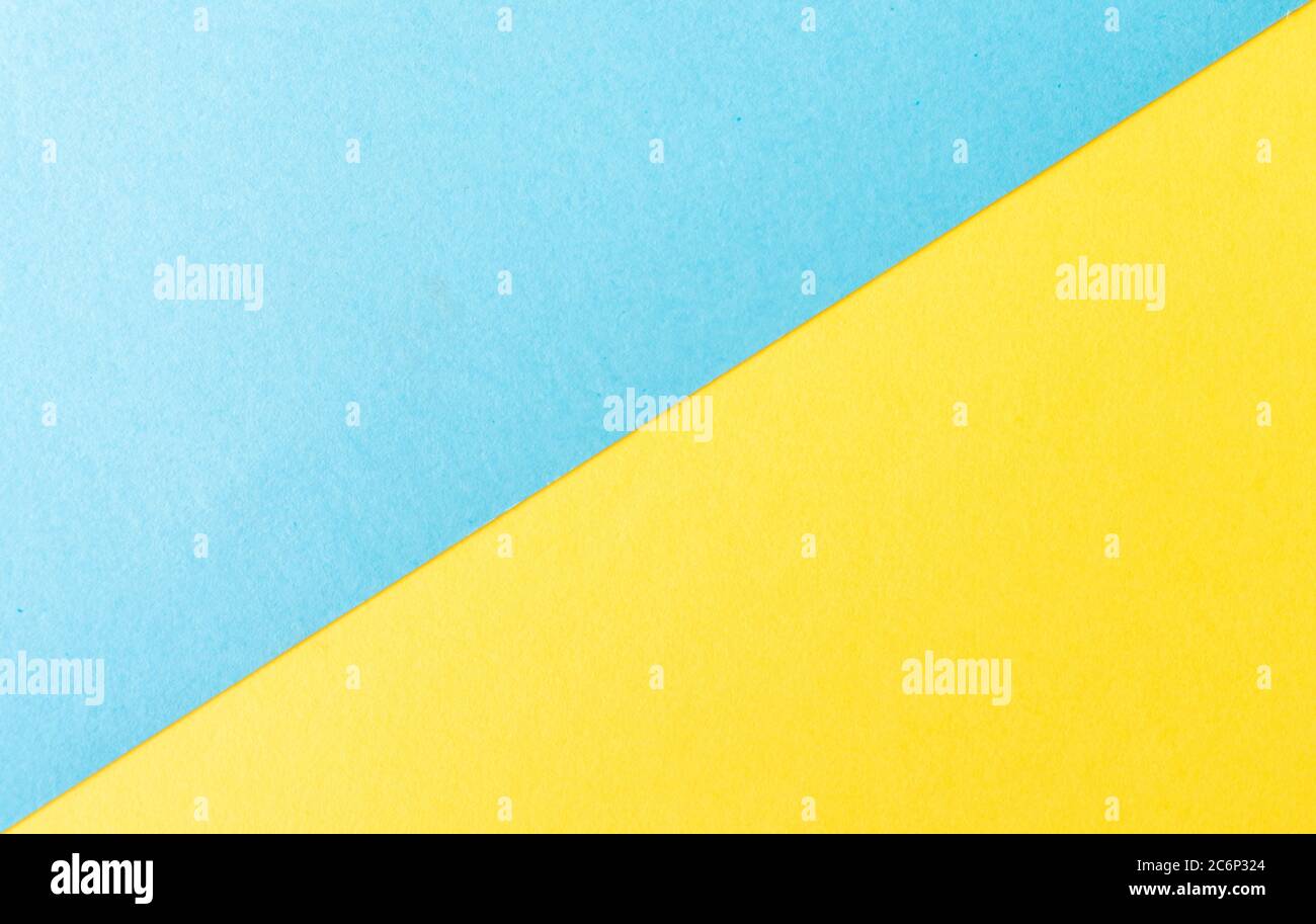 Carta blu e gialla diagonale sfondo diviso Foto Stock