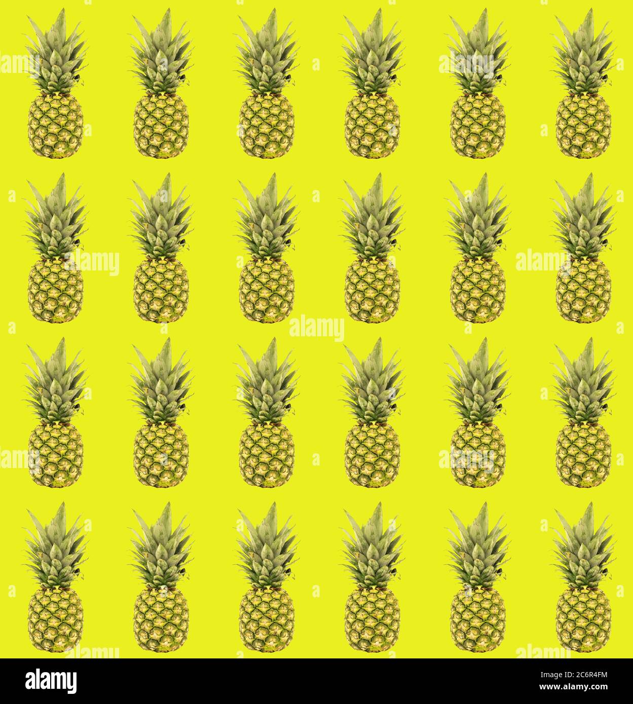 motivo senza cuciture di ananas su sfondo giallo Foto Stock