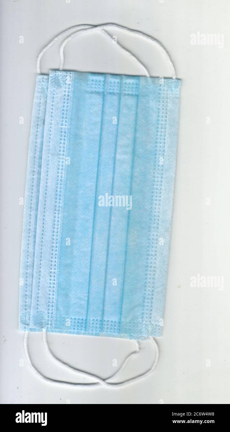 Immagine della maschera chirurgica che vengono utilizzate per proteggere e limitare la diffusione del virus. Foto Stock