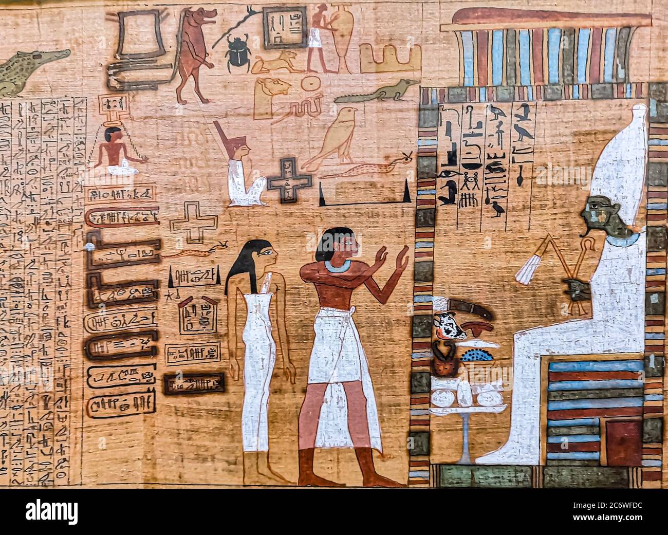 Antico papiro egiziano, immagine di dèi sul papiro. Foto Stock